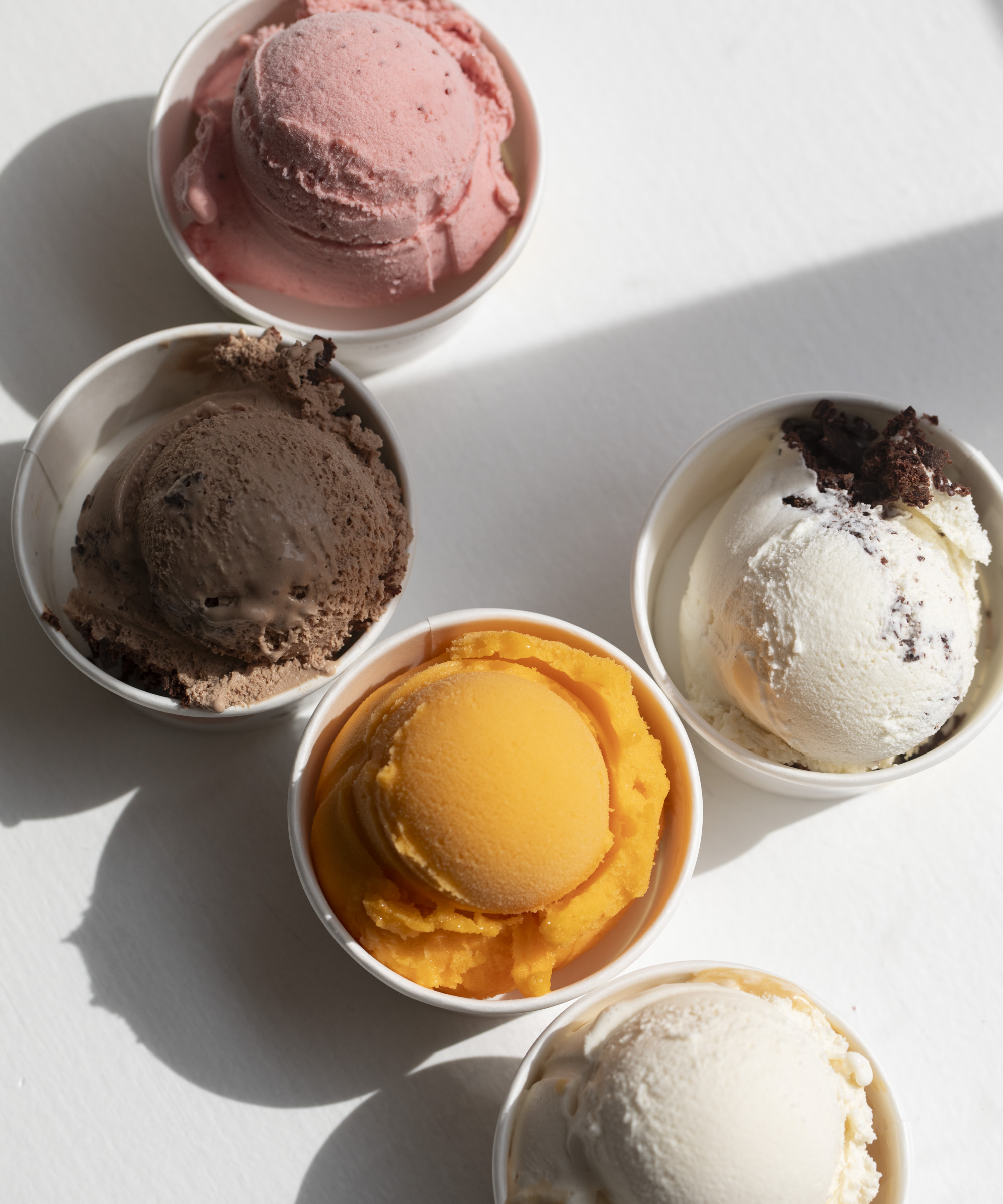 Pick whatever you like at Østerberg Ice Cream on Grønnegade – Lychee, Elderflower, Salted Caramel, and Olive Oil are showcased in artisanal Danish ice creams + sorbets