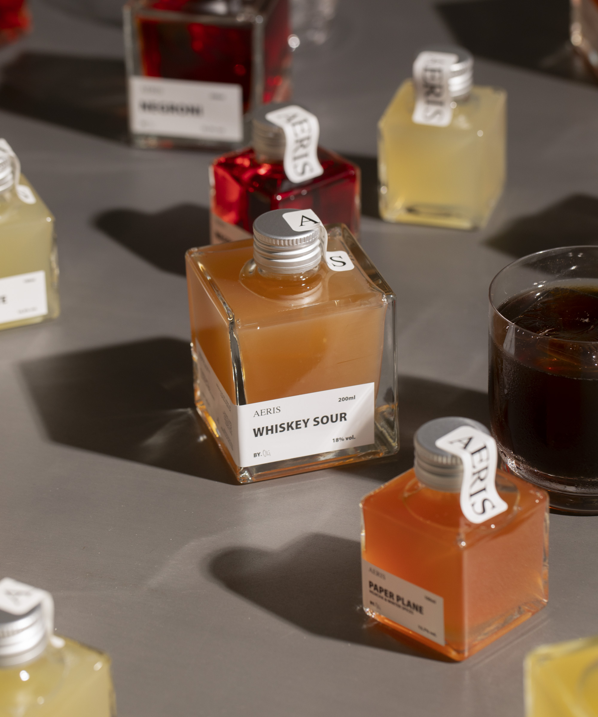 Pick whatever you like from the AERIS webshop — Celebrated by Vogue, Elle, and Euroman, these sleek bottled cocktails take the guesswork out of bartending at home