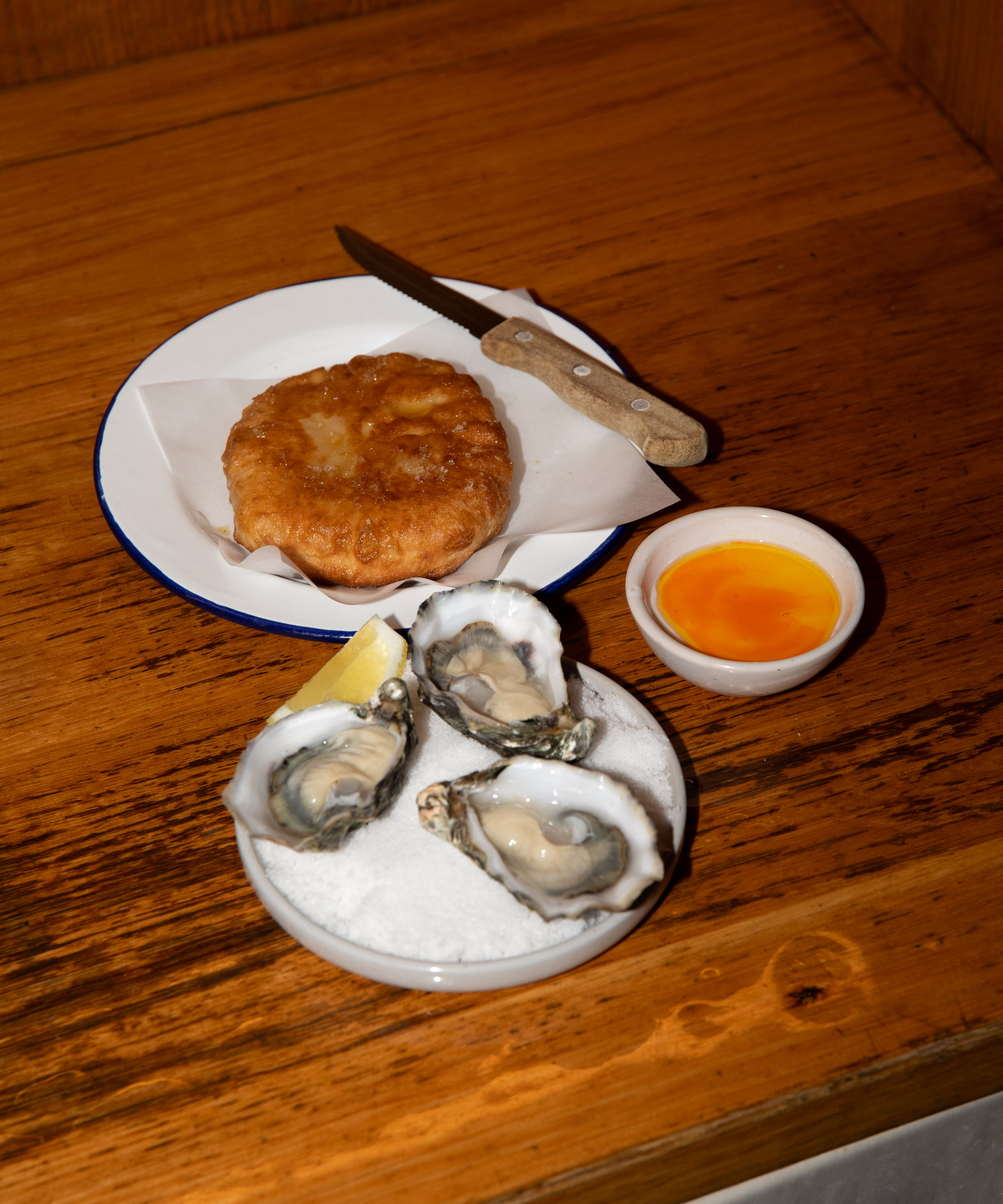 Pick whatever you like at Den Vandrette in City Center — Since 2013, Copenhagen’s essential wine bar pairs bottles with khachapuri and eclectic small plates