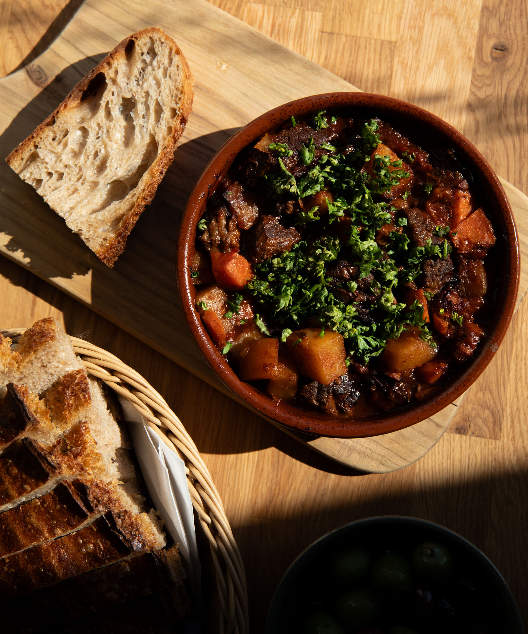 Pick whatever you like at Bjørnen & De Tolv Haner — A neighborhood favorite lands in Nordvest with wines on tap and space in the sun