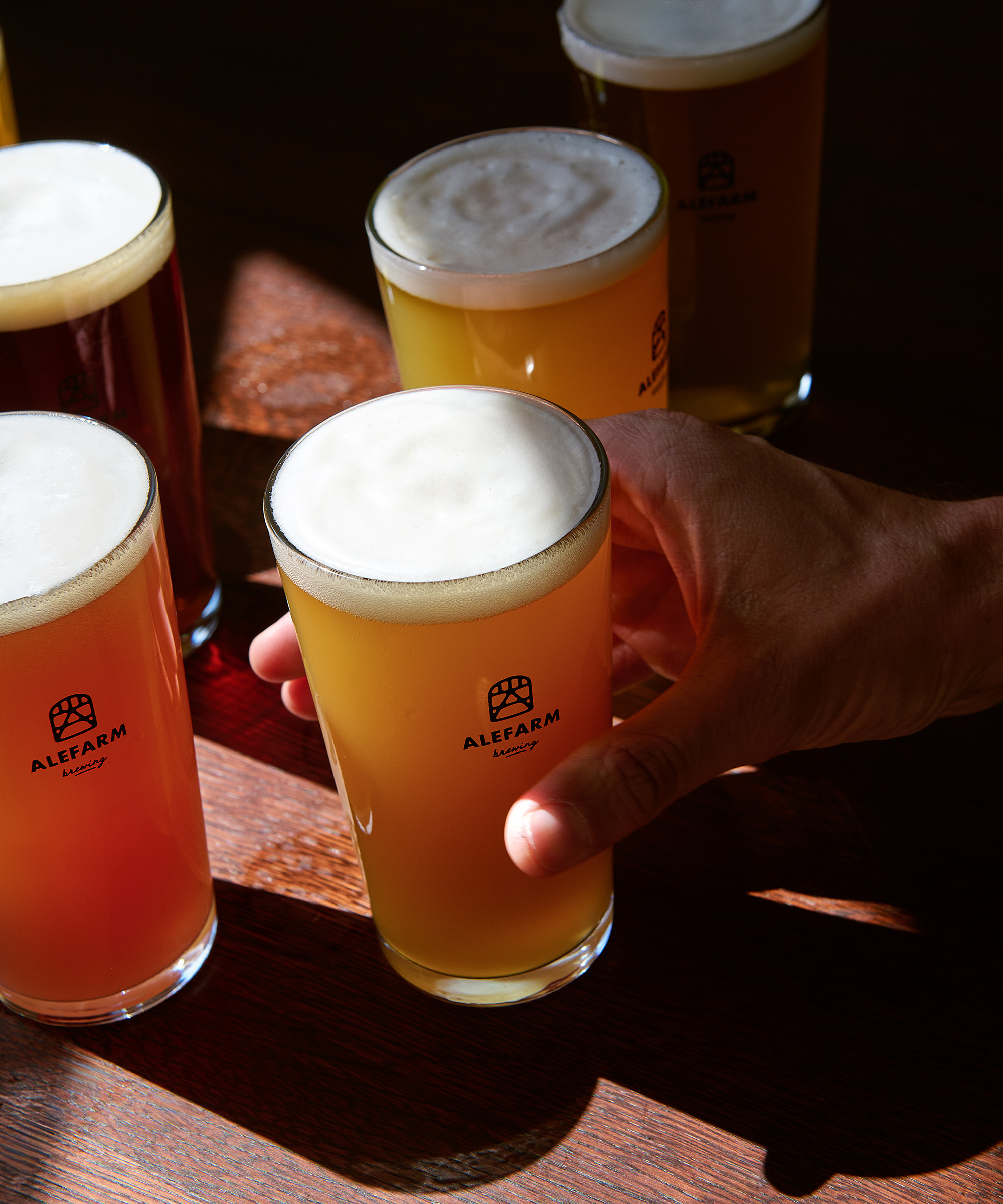 Pick any two draft beers at Alefarm Taproom in Nørrebro — A FRAMA-designed lakeside beer bar pours 20 taps of boundary-pushing Danish craft