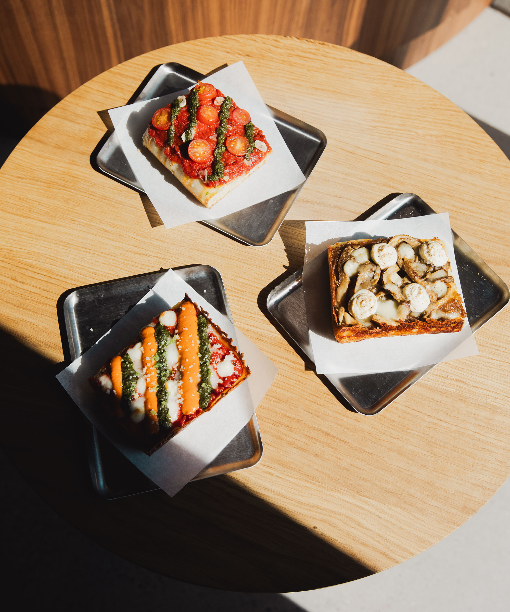 Pick any two slices + two dips + two beverages at KANT — Two former Michelin chefs bring Detroit-style sourdough pizza to Papirøen