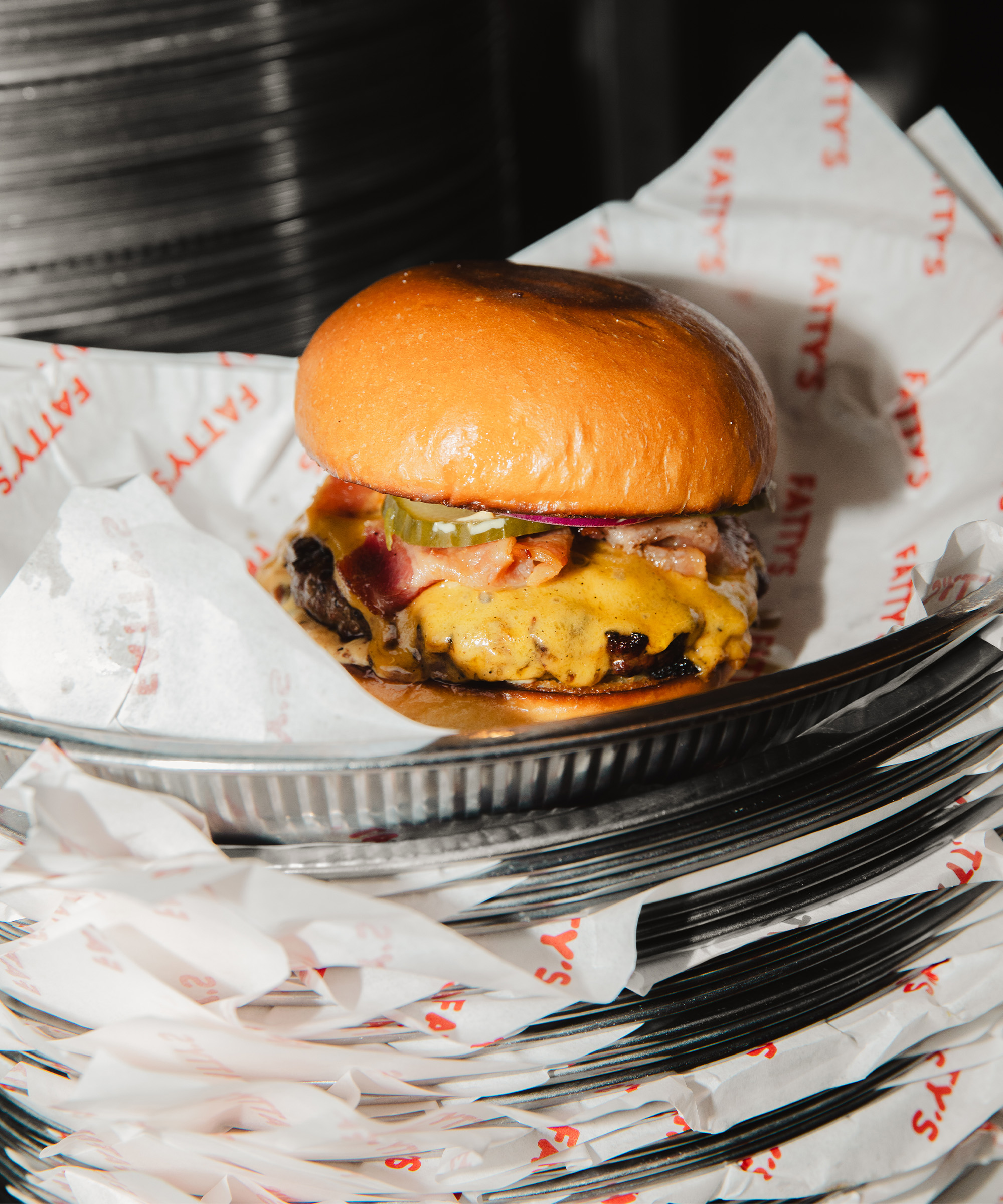 Pick any two burger combos at Fatty’s — Flame-grilled and buttermilk-fried burger classics in Islands Brygge and Nørrebro