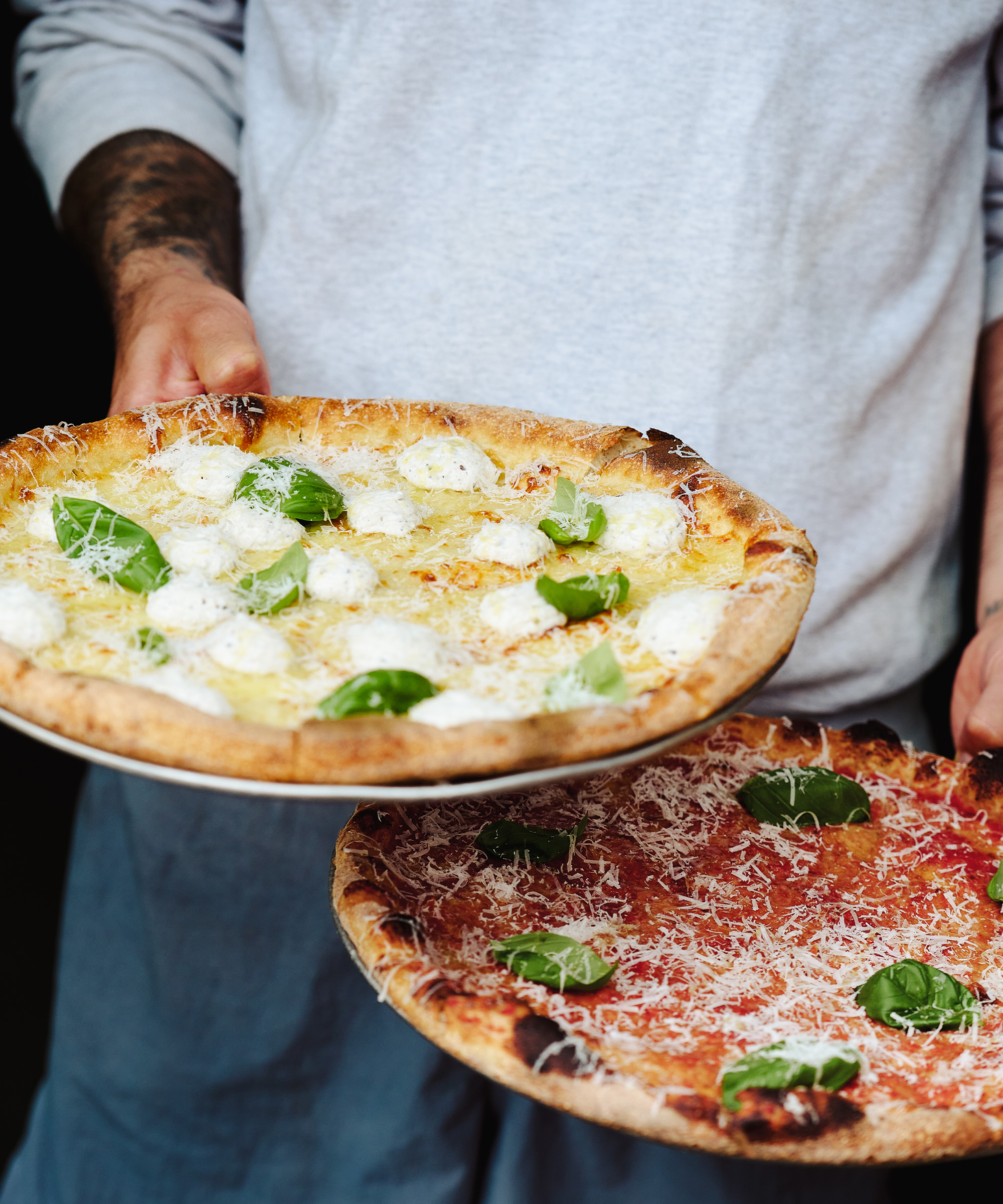 Pick any pizza + soft drink at Another Pizza in City Center — New York-style pies from a technicolor pizza shop
